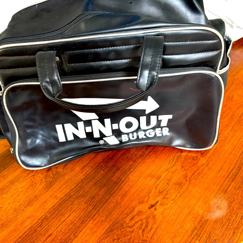In and out dark blue club bag